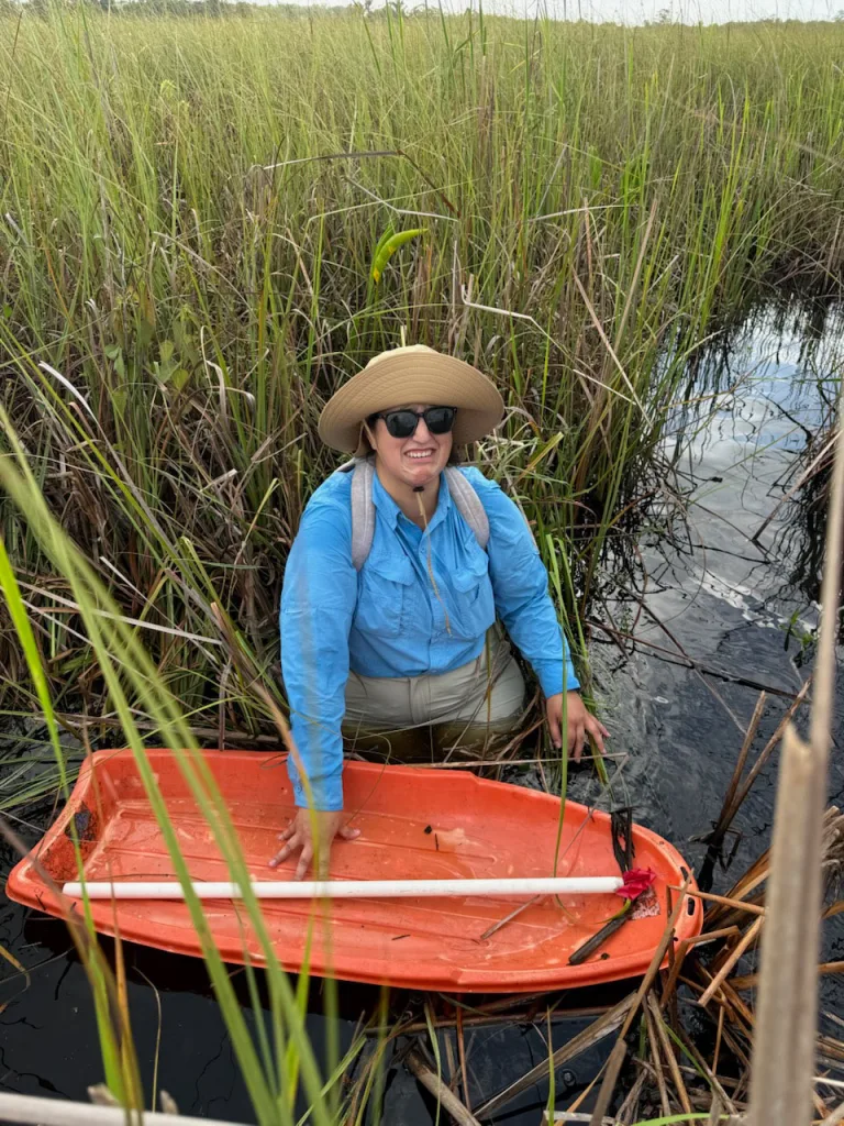 Isabella Saldarriaga wades through some serious wetlands